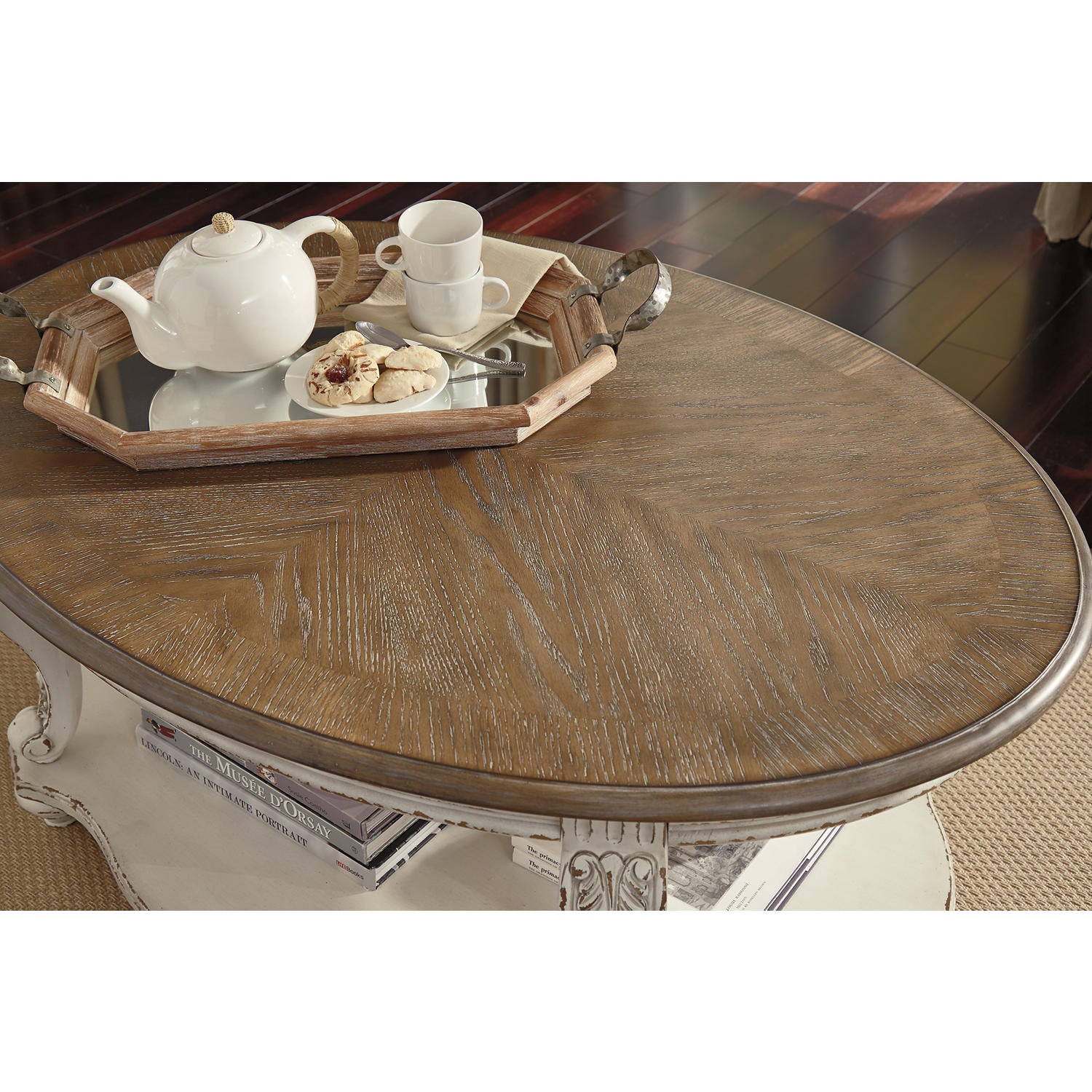 Realyn Oval Coffee Table - White/Brown